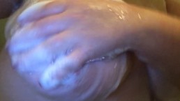 Shower Slut Rubs Giant Soapy Tits